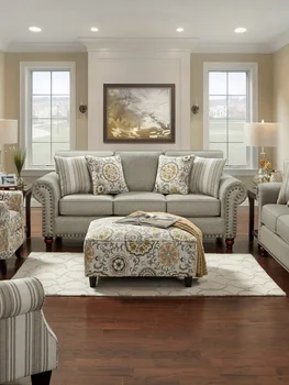 Новый американский легкий роскошный диван из воловьей кожи с четырьмя сиденьями в гостиной - это простой современный небольшой семейный гарнитур.